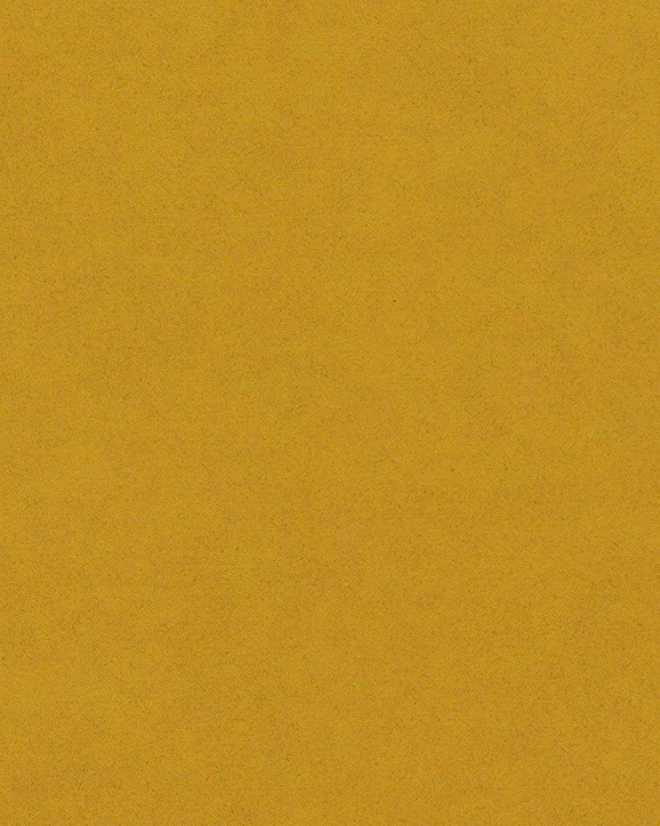 Eine helle, sonnengelbe Oberfläche eines durchgefärbten MDFs ist der Fokus dieser Aufnahme. Die ökologisch geölte Schicht schützt das Material, während die Holzfasern eine lebendige und natürliche Optik erzeugen.